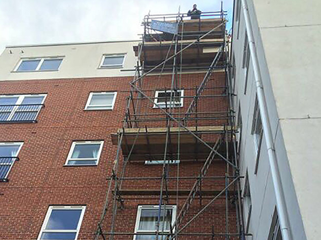 scaffolding on brick building